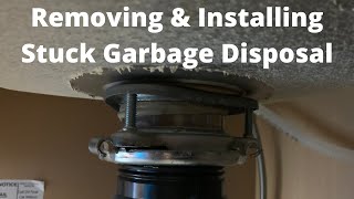 Remove and Install a Stuck Garbage Disposal [upl. by Hplodur]