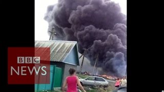 MH17 New footage shows crash aftermath  BBC [upl. by Aihsened495]