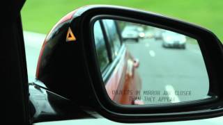 Active Blind Spot Detection  BMW HowTo [upl. by Lyford]