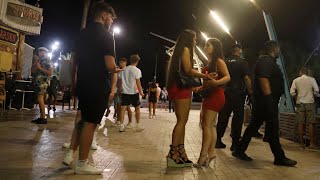 Magaluf residents fury as drunk British holidaymakers wear no masks and jump on cars [upl. by Nauwtna]