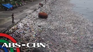 Garbage accumulates in Manila Bay after heavy rains [upl. by Gariepy]